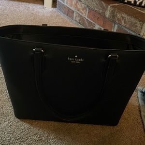 Kate Spade medium black tote. Perfect condition. Only used a few times.